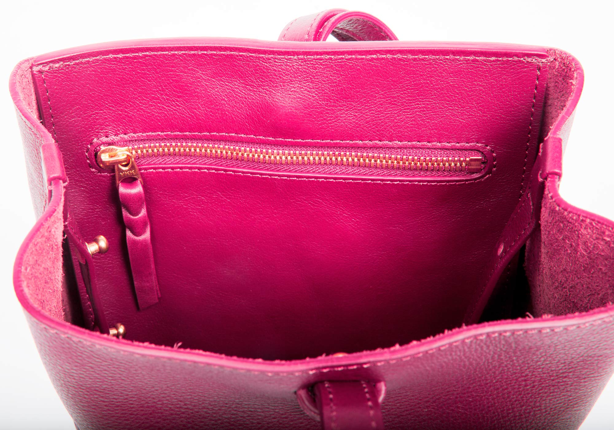 The Mini Sling Backpack Magenta