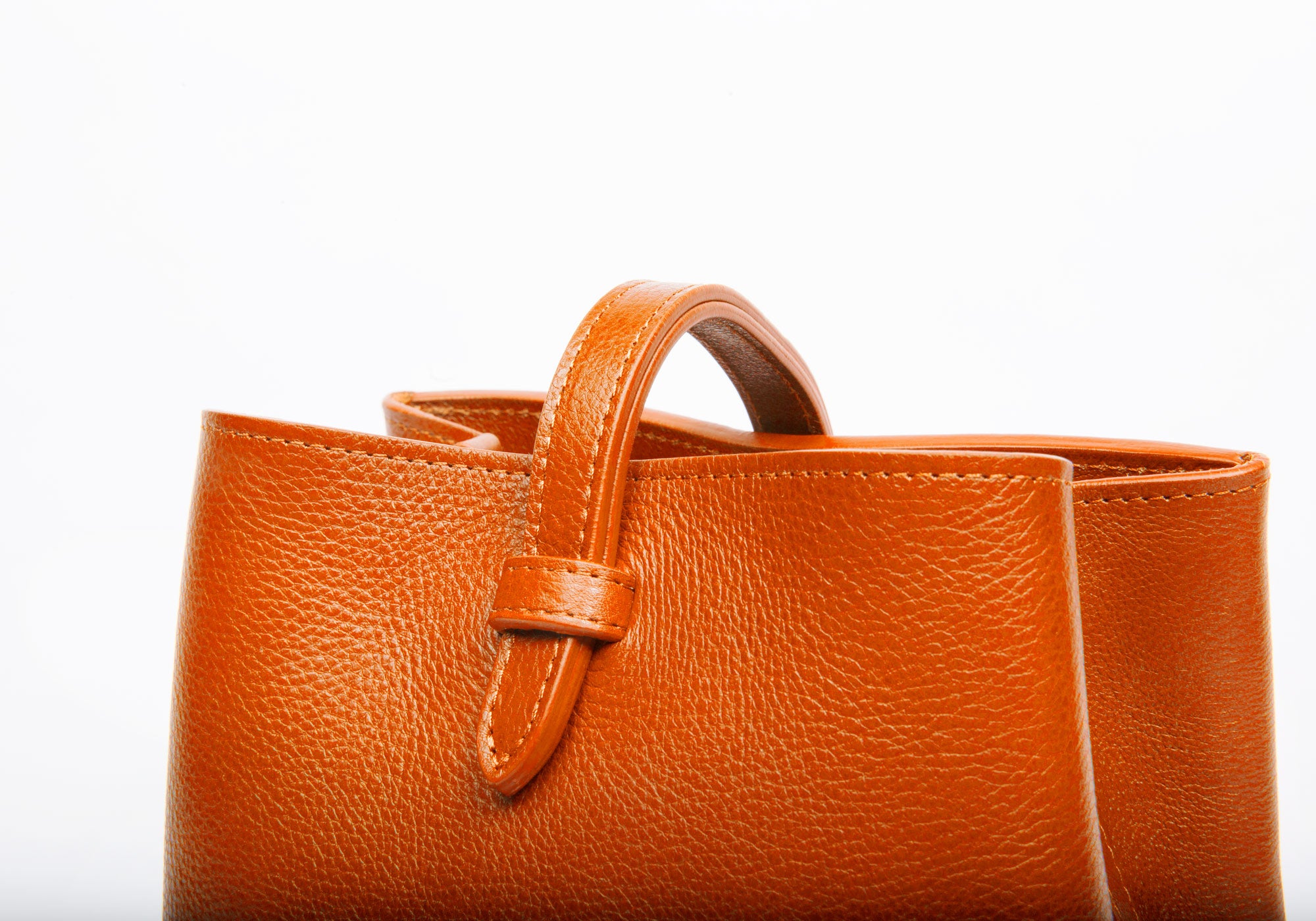 The Mini Sling Backpack Orange