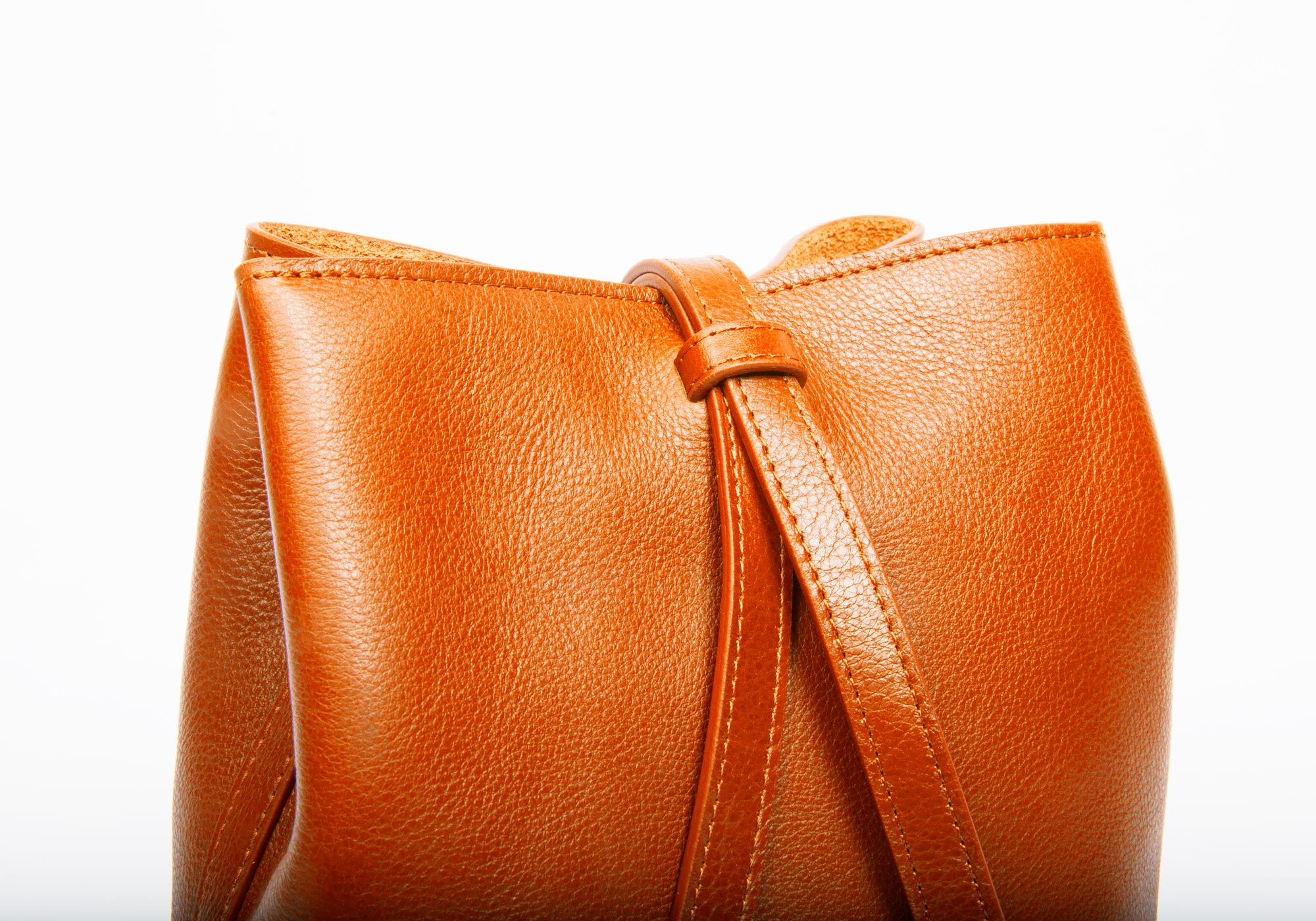 The Mini Sling Backpack Orange