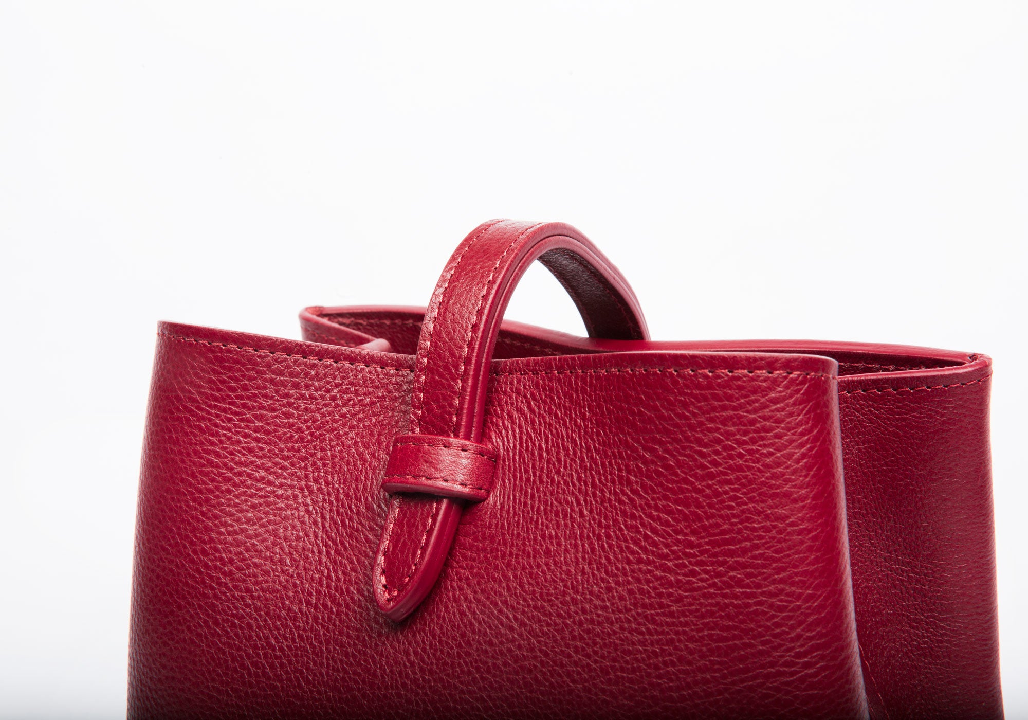 The Mini Sling Backpack Red