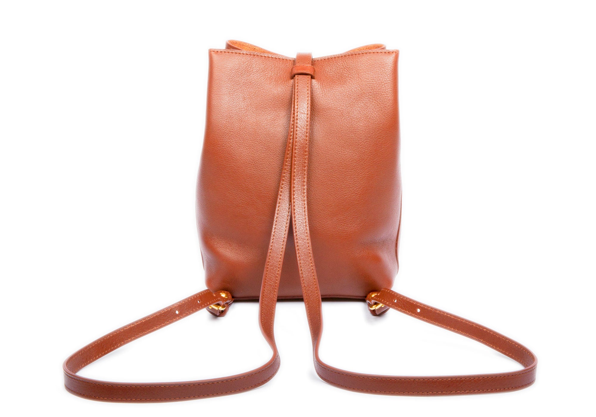 The Mini Sling Backpack Saddle Tan