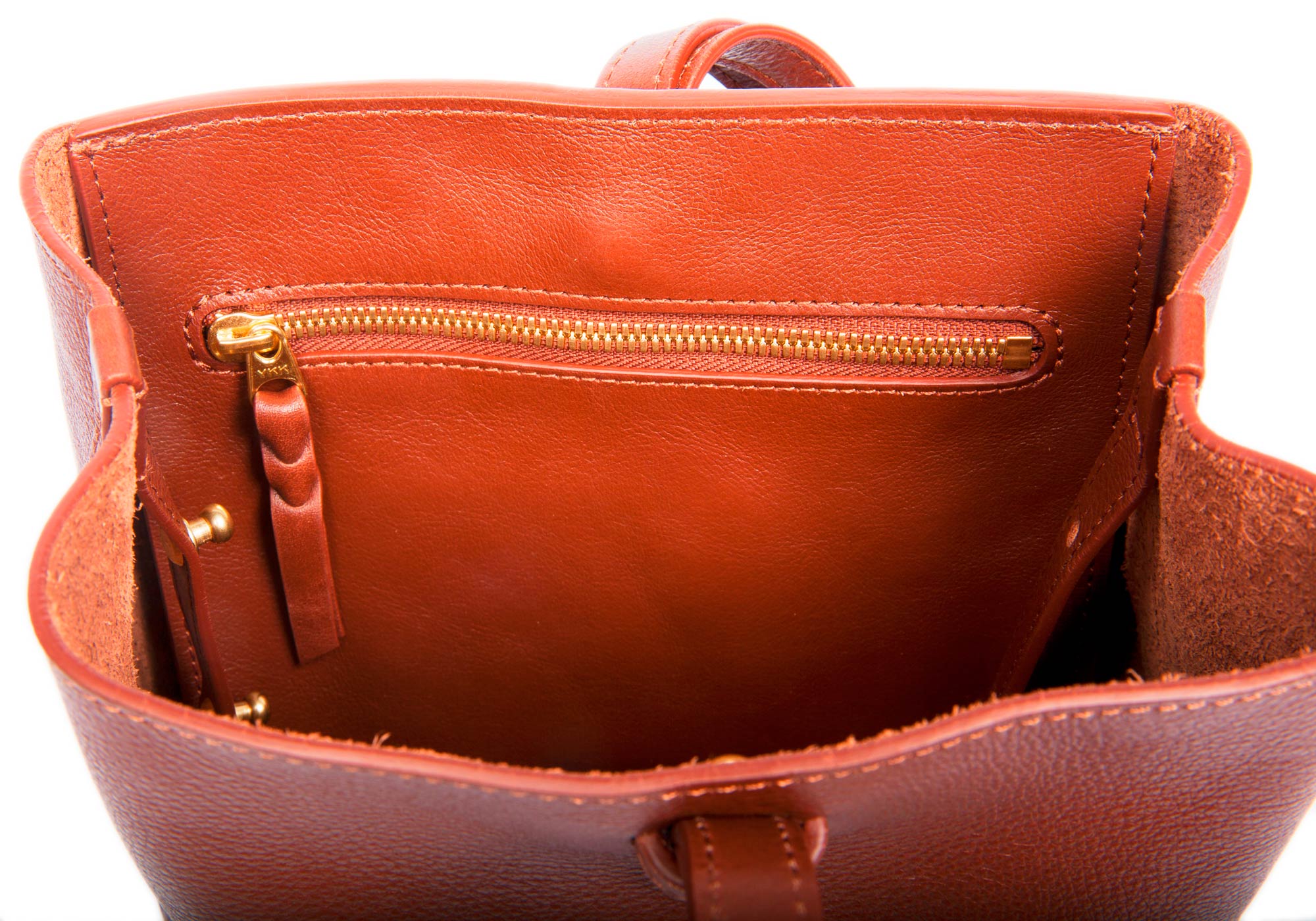 The Mini Sling Backpack Saddle Tan