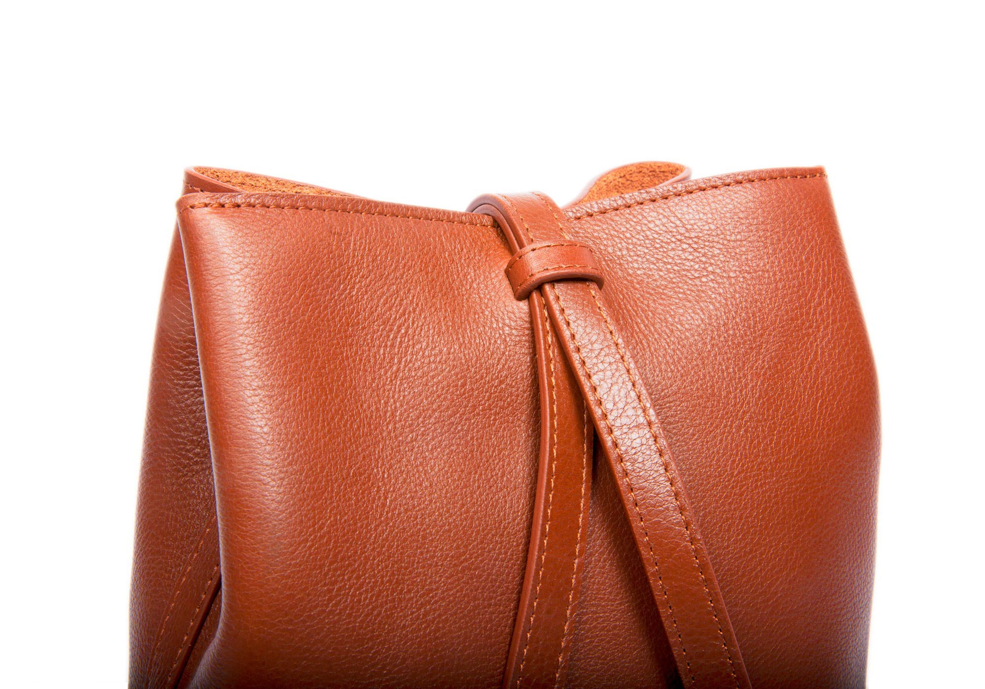 The Mini Sling Backpack Saddle Tan