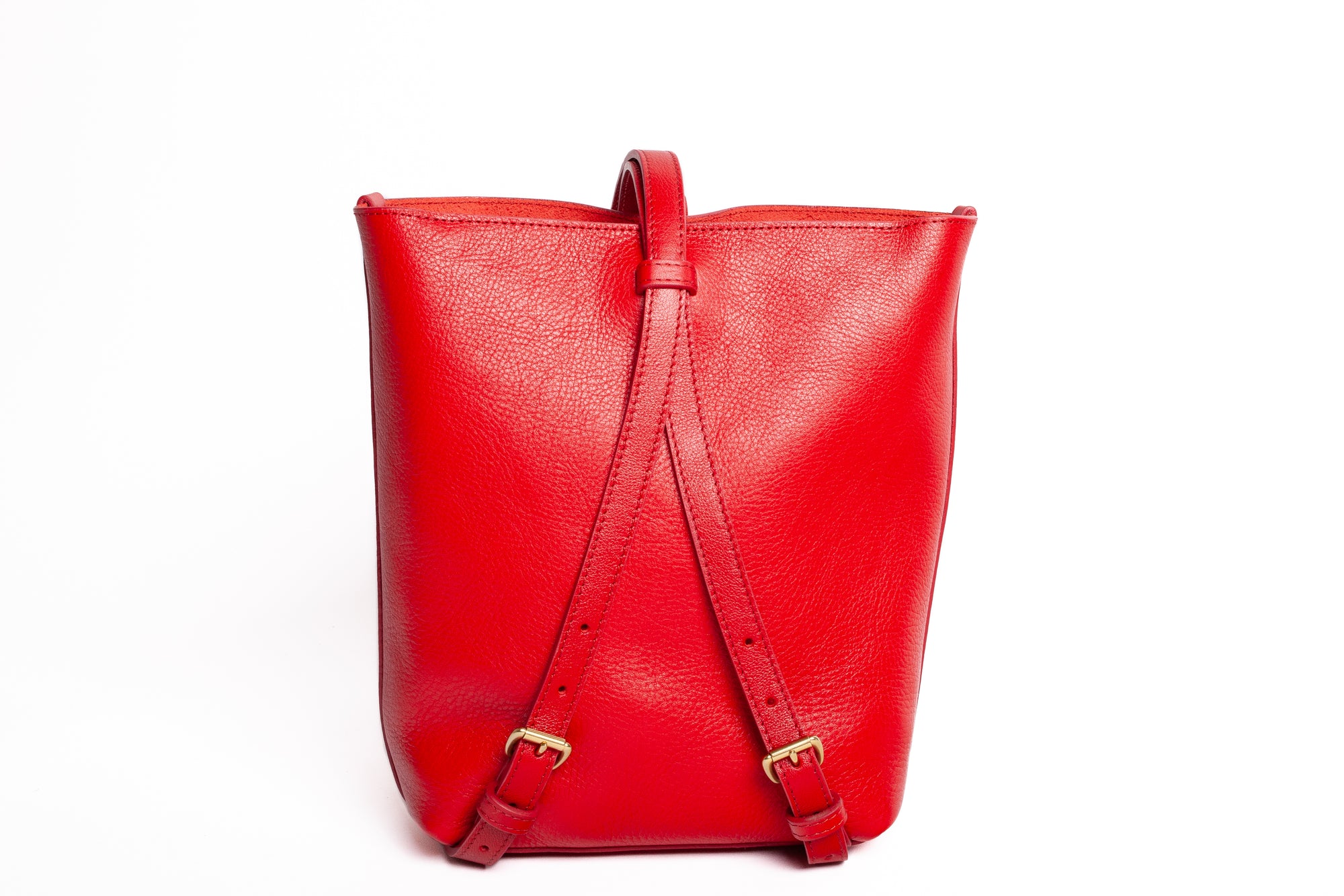The Mini Sling Backpack Pop Red
