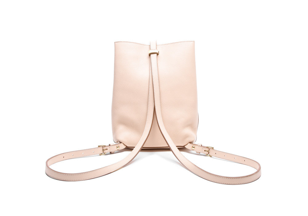 Back Leather Straps of The Mini Sling Backpack Natural