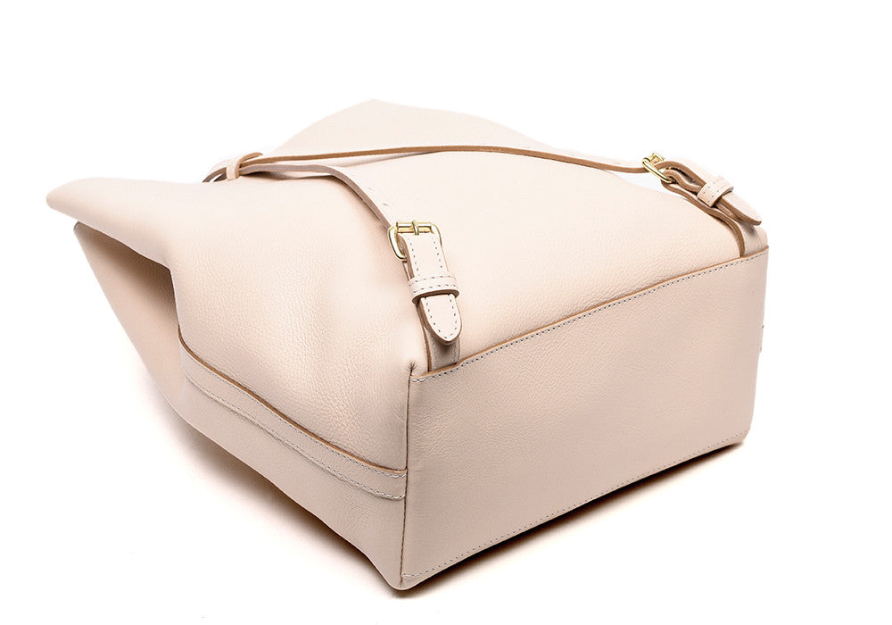 Back Leather Straps of The Sling Backpack Natural